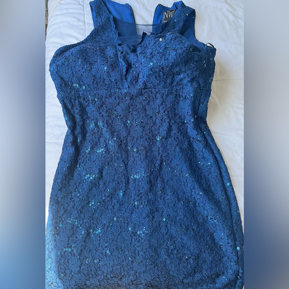 Sparking blue cocktail dress. Perfect for a wedding.